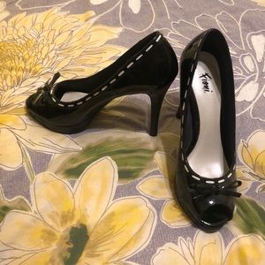 Fioni high heel black and white peep toe pumps